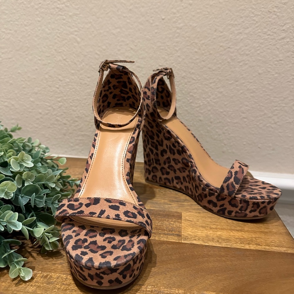 Wedged cheetah print heels